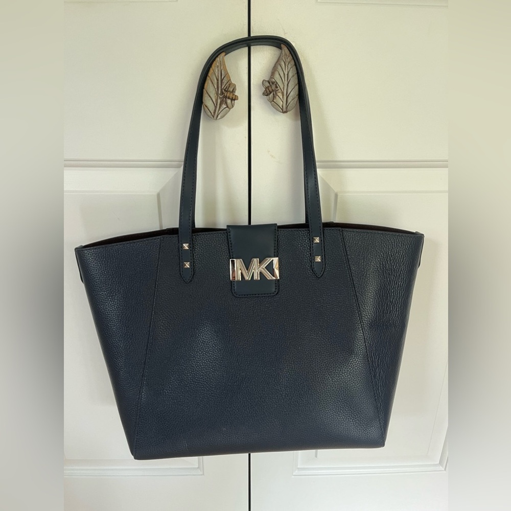 Michael Kors NWOT travel bag.